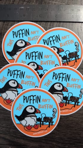 Customer's custom vinyl stickers with a cartoon puffin design and the text "This Puffin Ain't Bluffin".