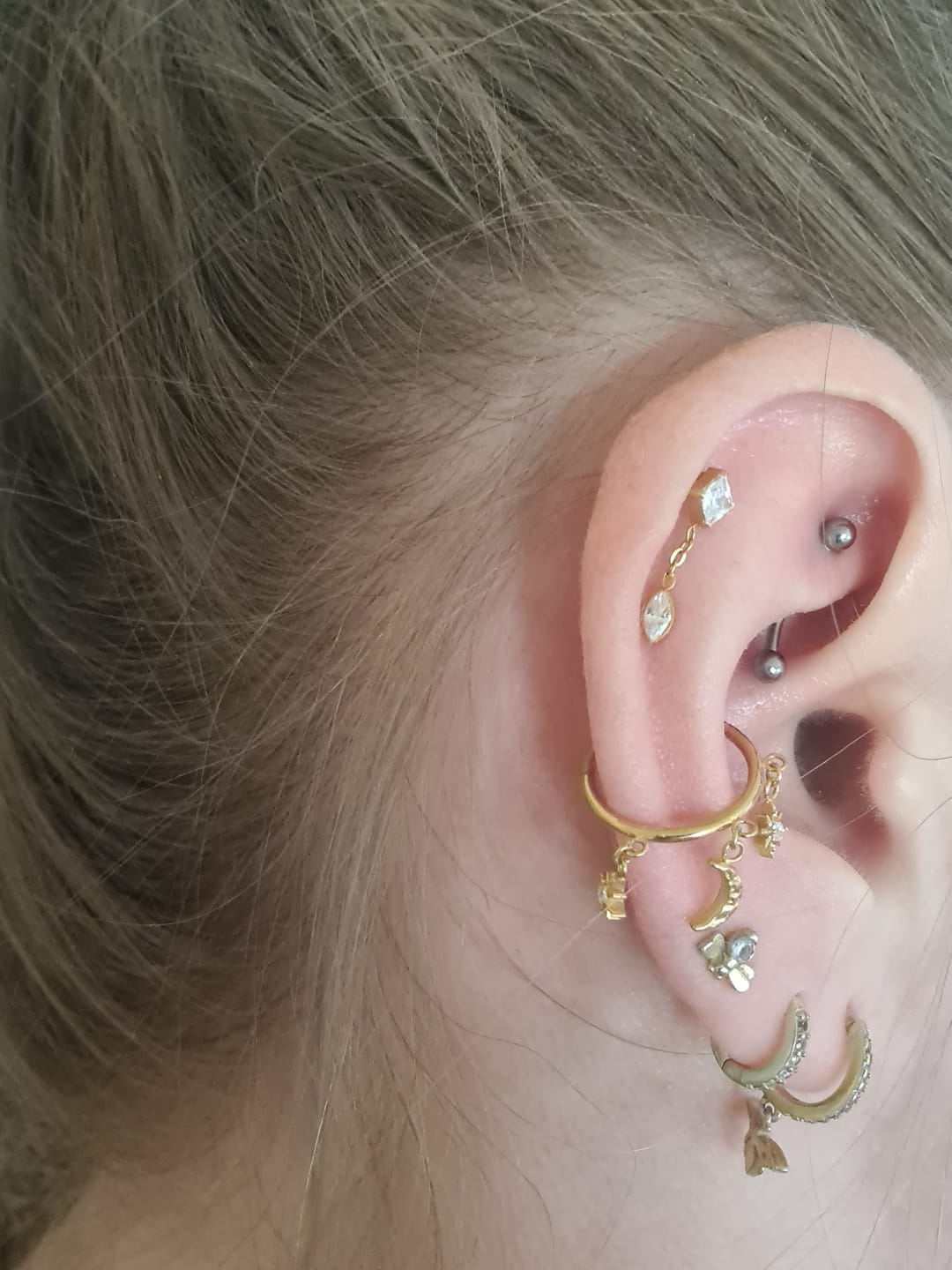 Customer photo review of Night Conch Piercing | Titan