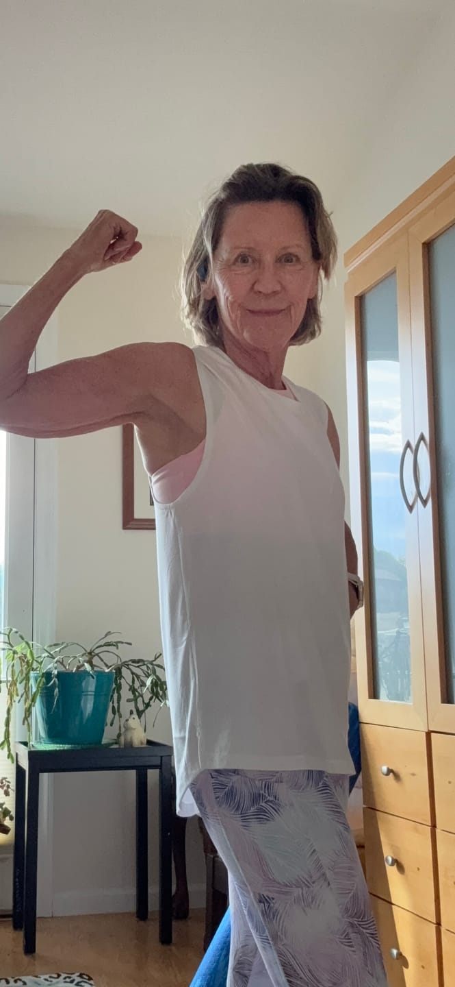 Customer photo review of Flowy Scoop Hem Muscle Tank