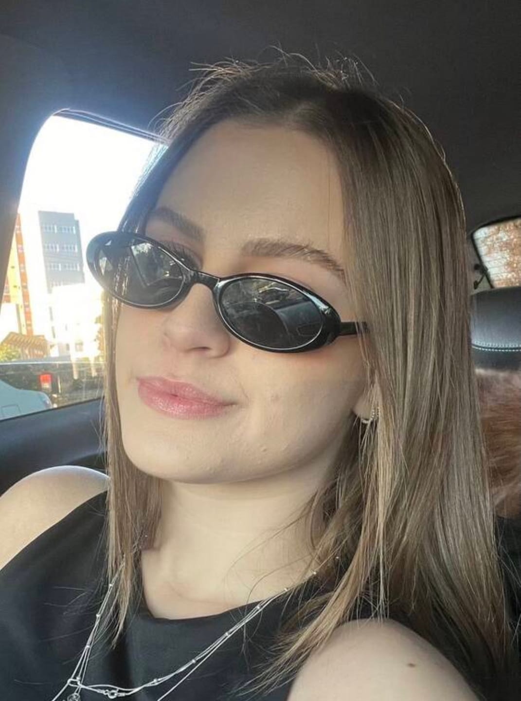 Customer photo review of Lentes de sol - Juliet Negro.