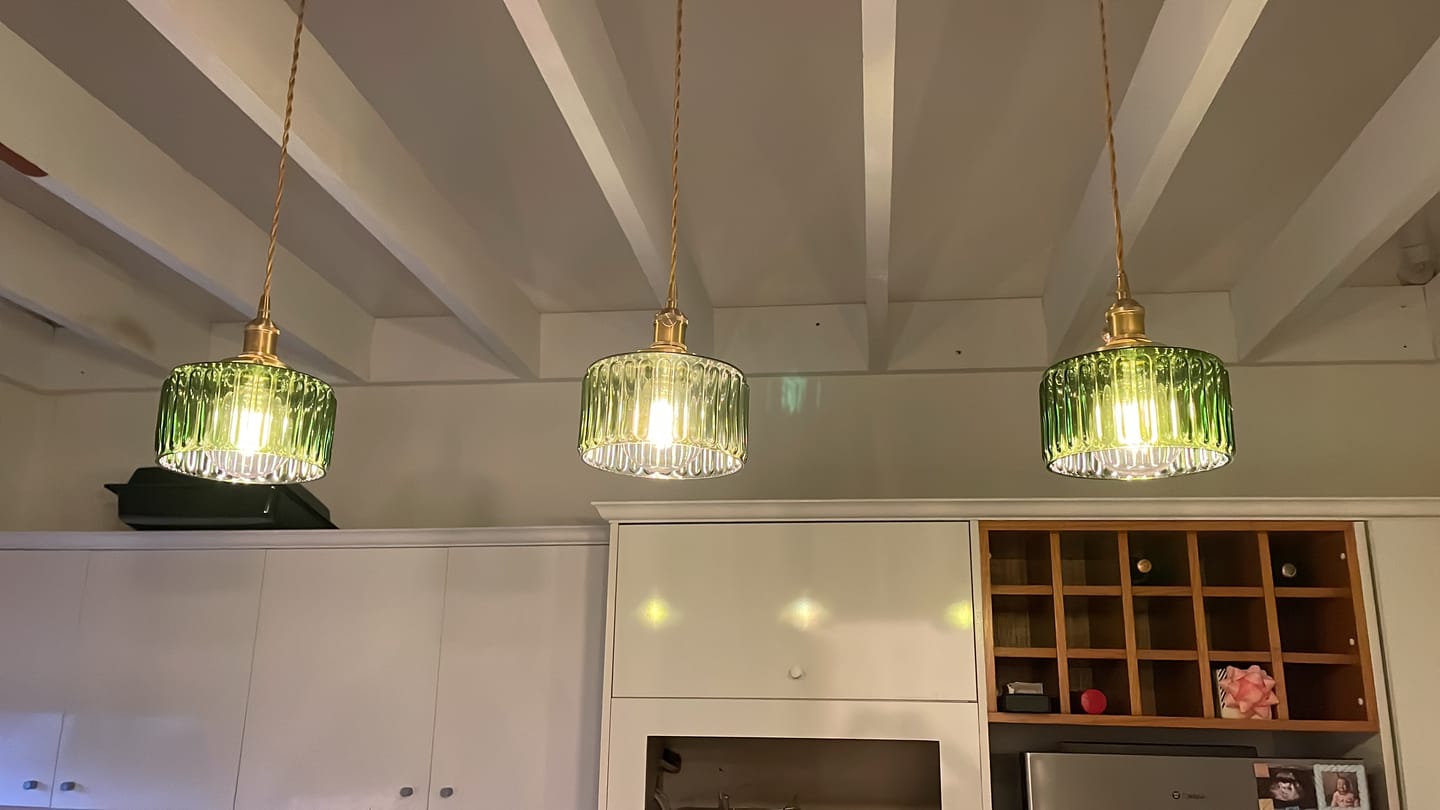 Customer photo review of Vintage Minimalist 1-Light Strip Patterned Glass Drum Round Pendant Light
