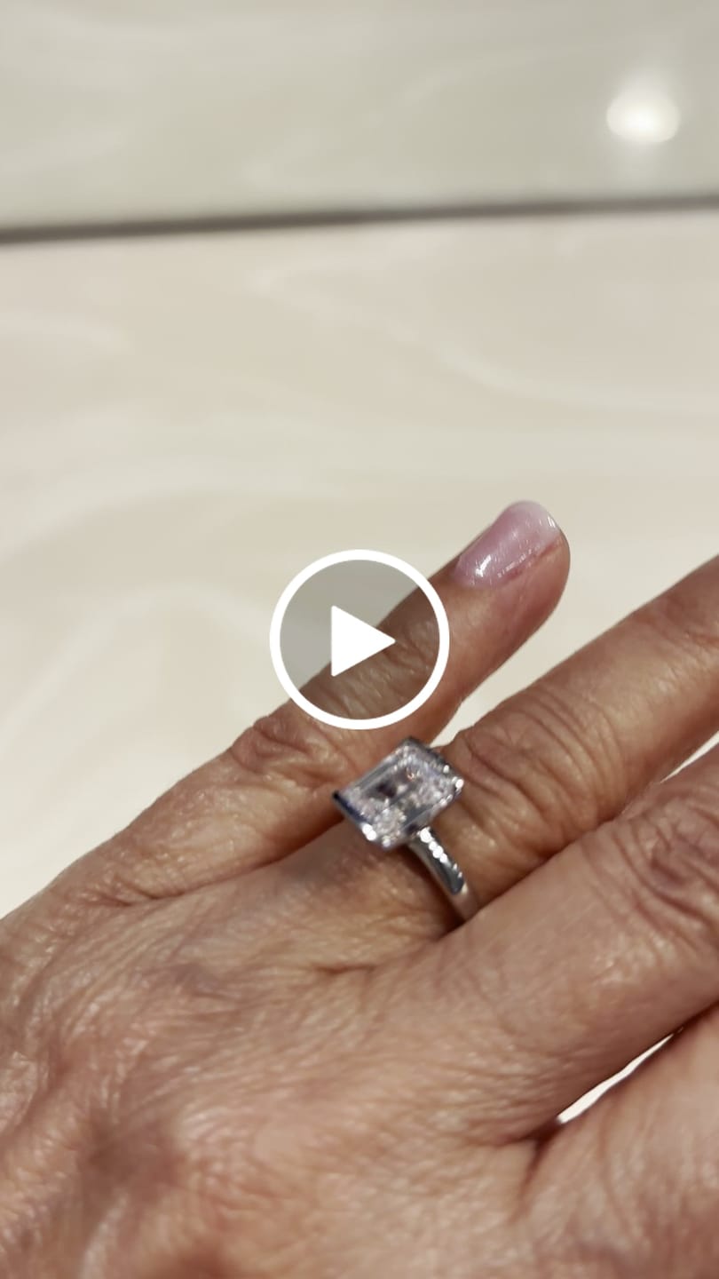 Customer video review of Solitaire 2.6ct Bezel Emerald Cut CZ Ring in Sterling Silver