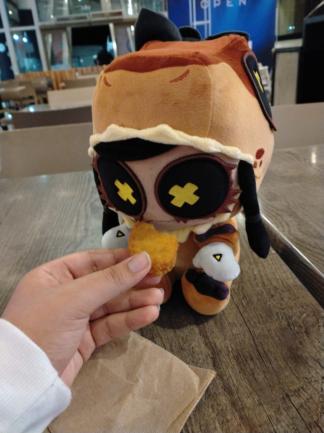 Customer photo review of Cyn T-Rex Plush