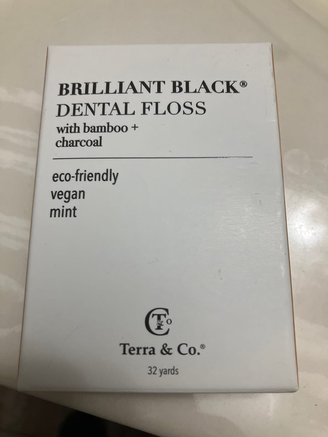 Customer photo review of Brilliant Black® Floss – Whitens Between Teeth Naturally