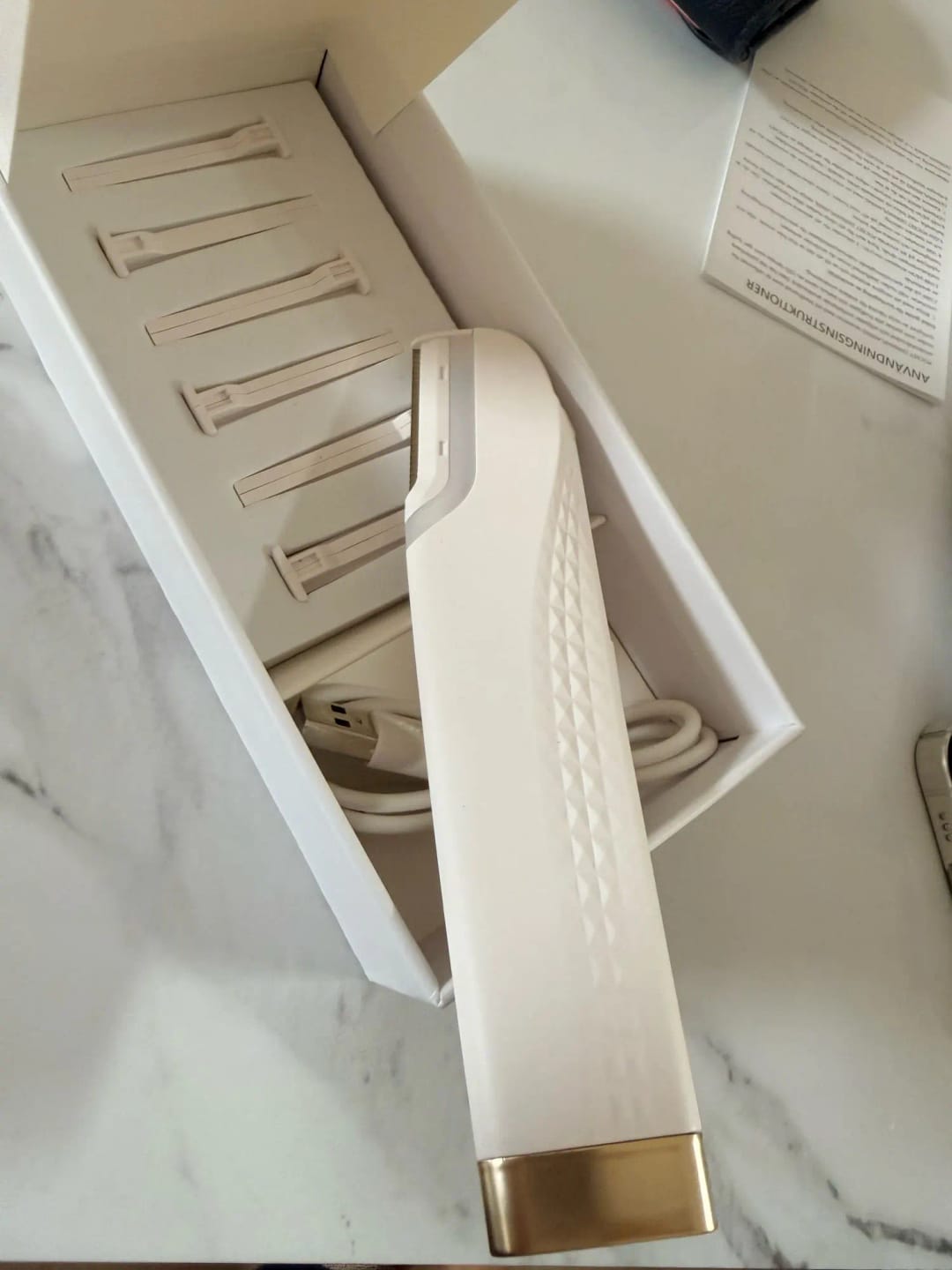 Customer photo review of Painless Electric Eyebrow Trimmer & Epilator for Women
