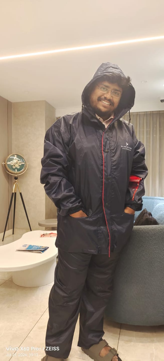Customer photo review of Navy with Red Border - Rain Jacket with Pant and Mobile Pouch