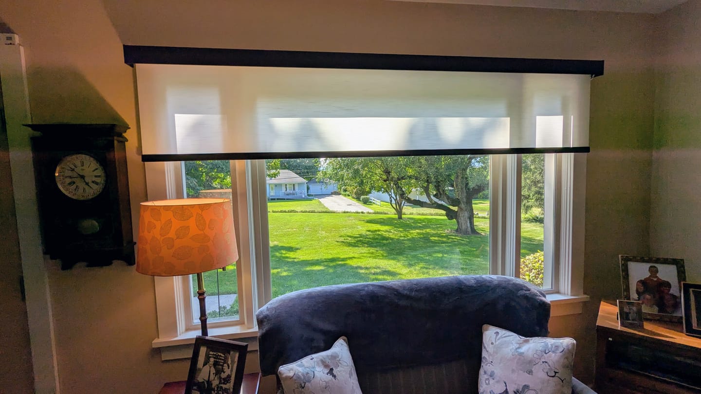 Customer photo review of SmartWings Motorized Light Filtering Roller Shades 70% Blackout Essential
