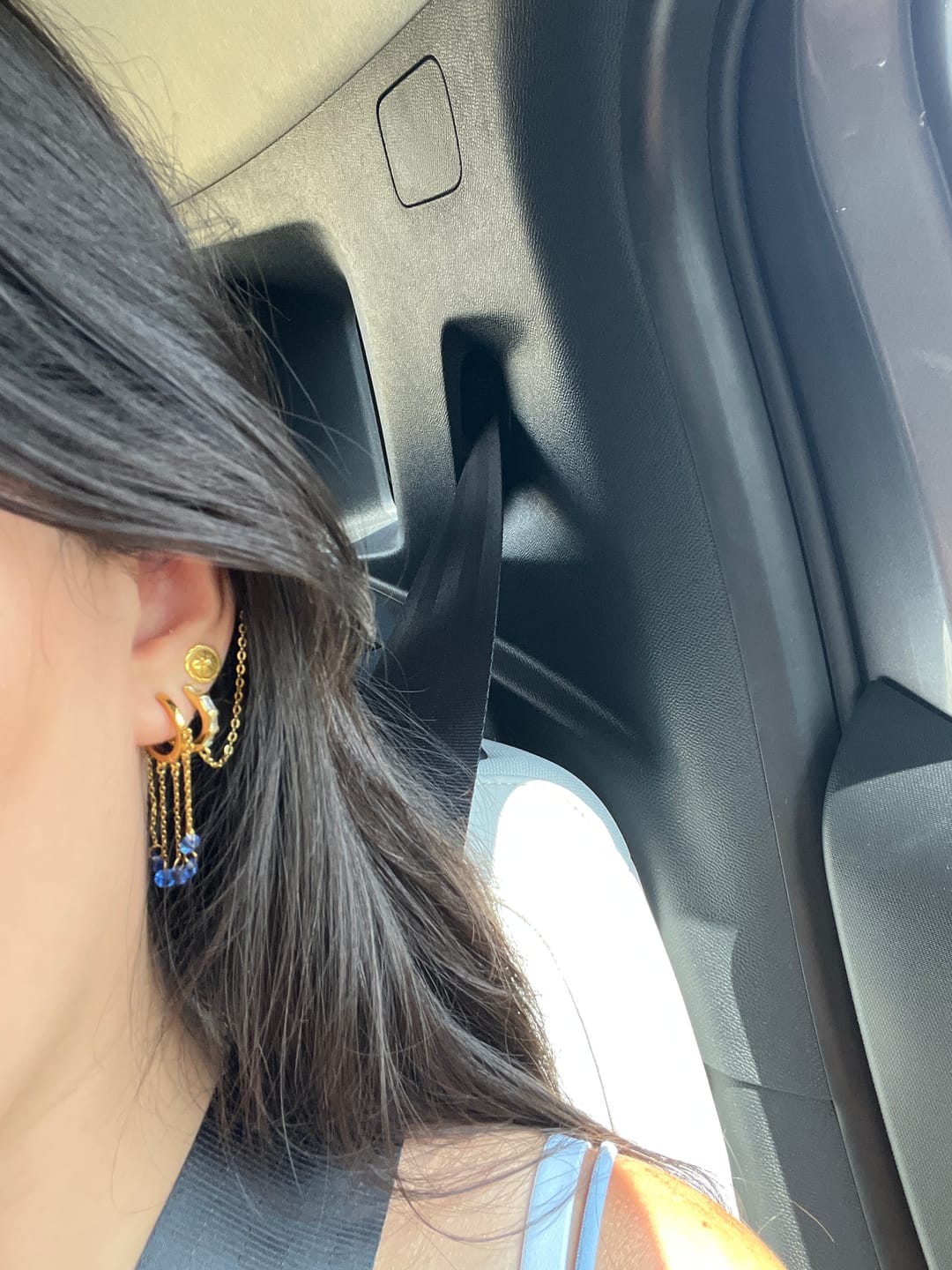 Customer photo review of Alisa Gold Blue Huggie Earrings