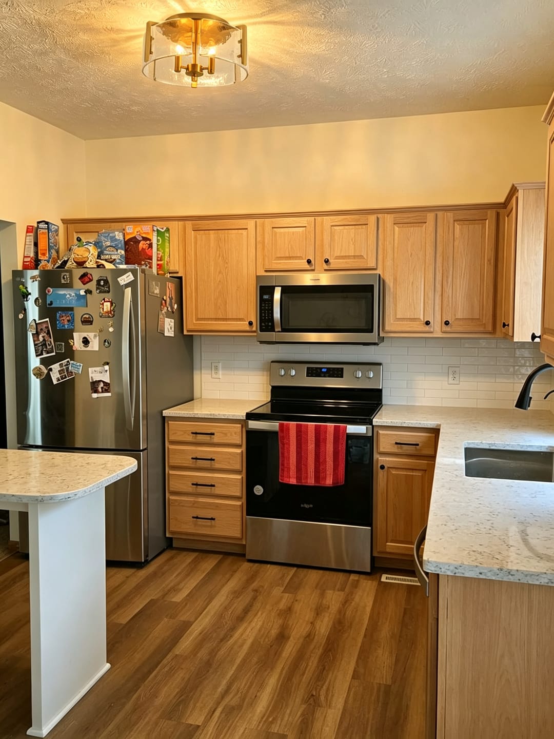 Customer photo review of Modern Brass 3-Light Rippled Glass Round Drum Semi-flush Mount