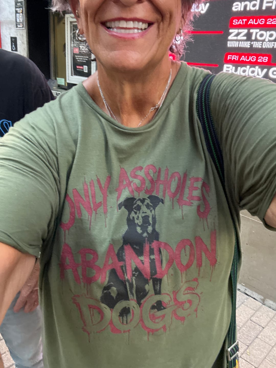Customer photo review of Assholes Abandon Dogs Shirt