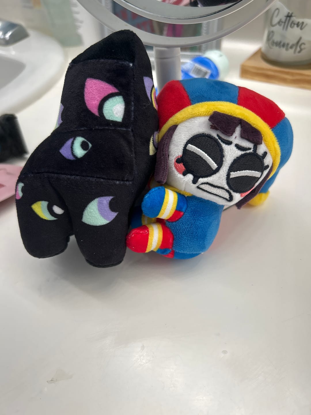 Customer photo review of Pomni & Abstraction Magnetic Plush Keychains