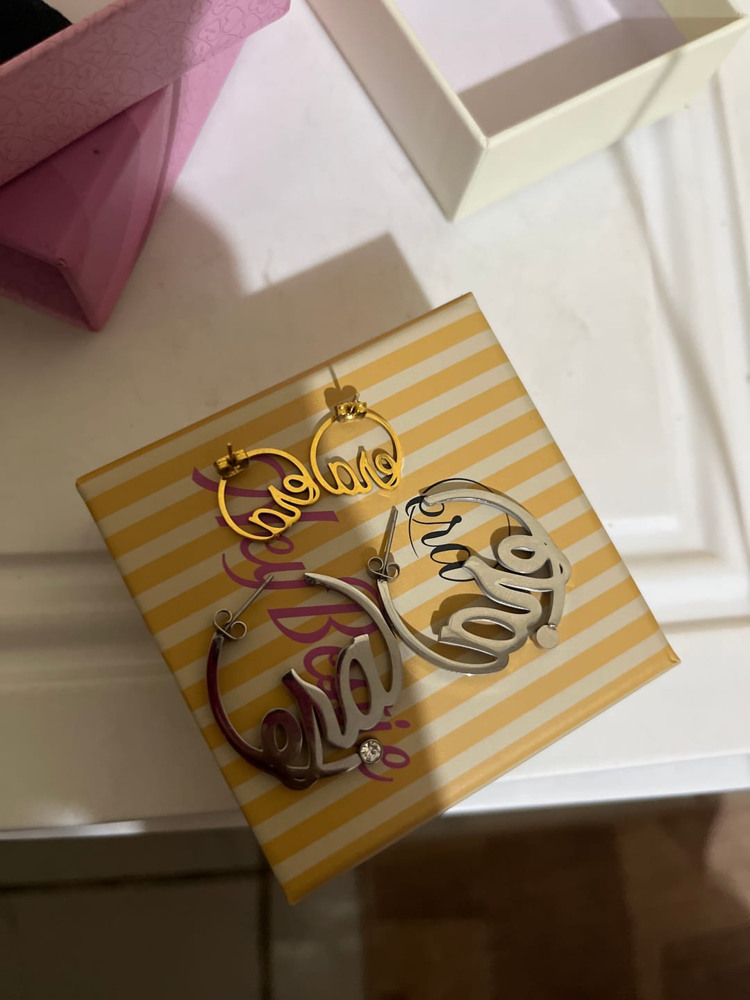 Customer photo review of Silver Era Logo Mini Hoops