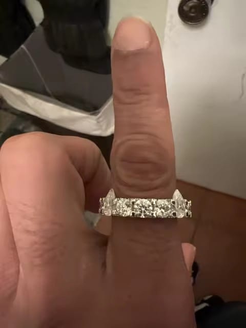 Customer photo review of 50 Pointer Round Mix Pear Cut Side Iced Eternity Ring Moissanite