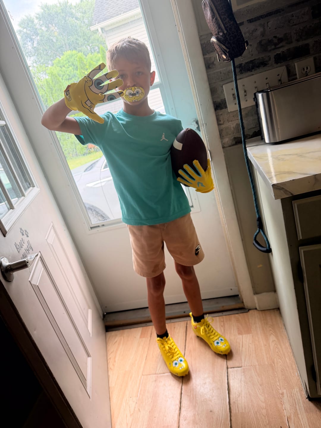 Customer photo review of SpongeBob Football Gloves - VPS5 By Phenom Elite