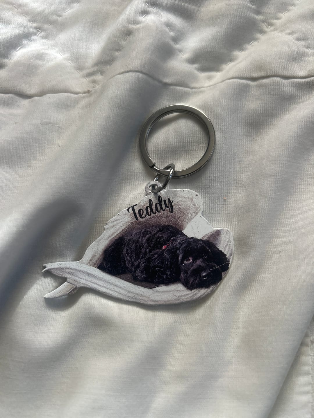 Customer photo review of Personalized Stainless Dog Sleeping Angel Keychain - Double Sides Printed