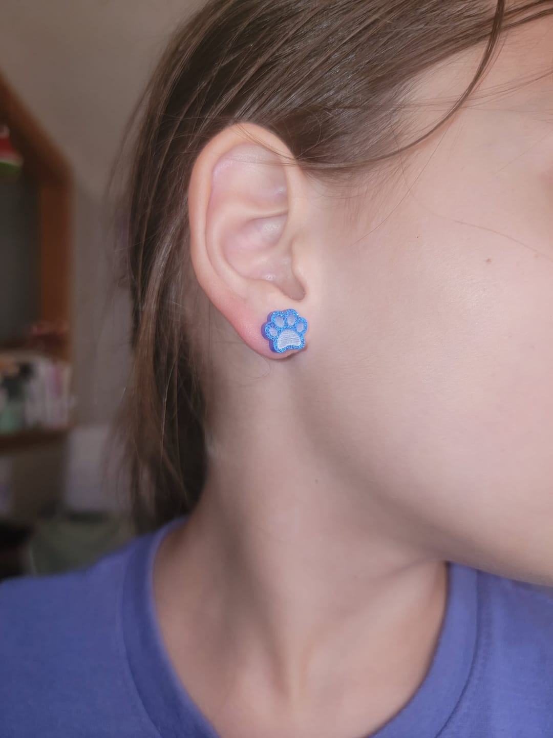 Customer photo review of Paw Print Studs Hypoallergenic Earrings for Sensitive Ears with Plastic Posts