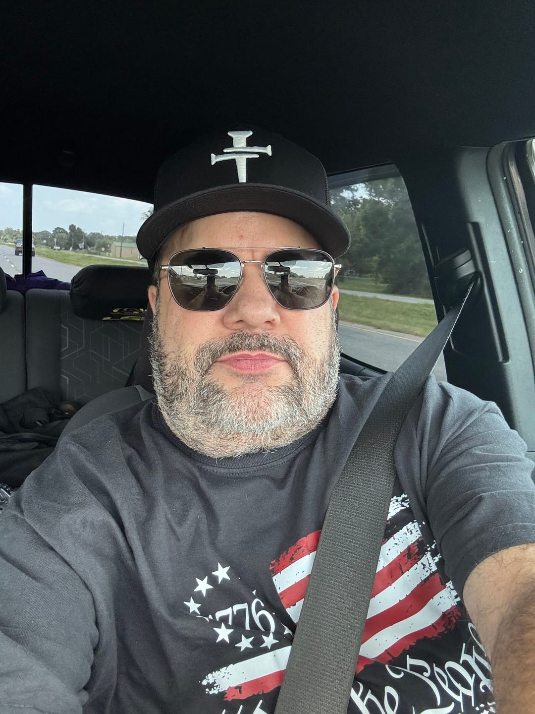 Customer photo review of DGO Cross of Nails Embroidered Trucker Hat