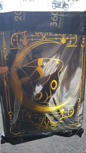 Customer photo review of Lunar Shadow 9-Pocket Trading Card Binder