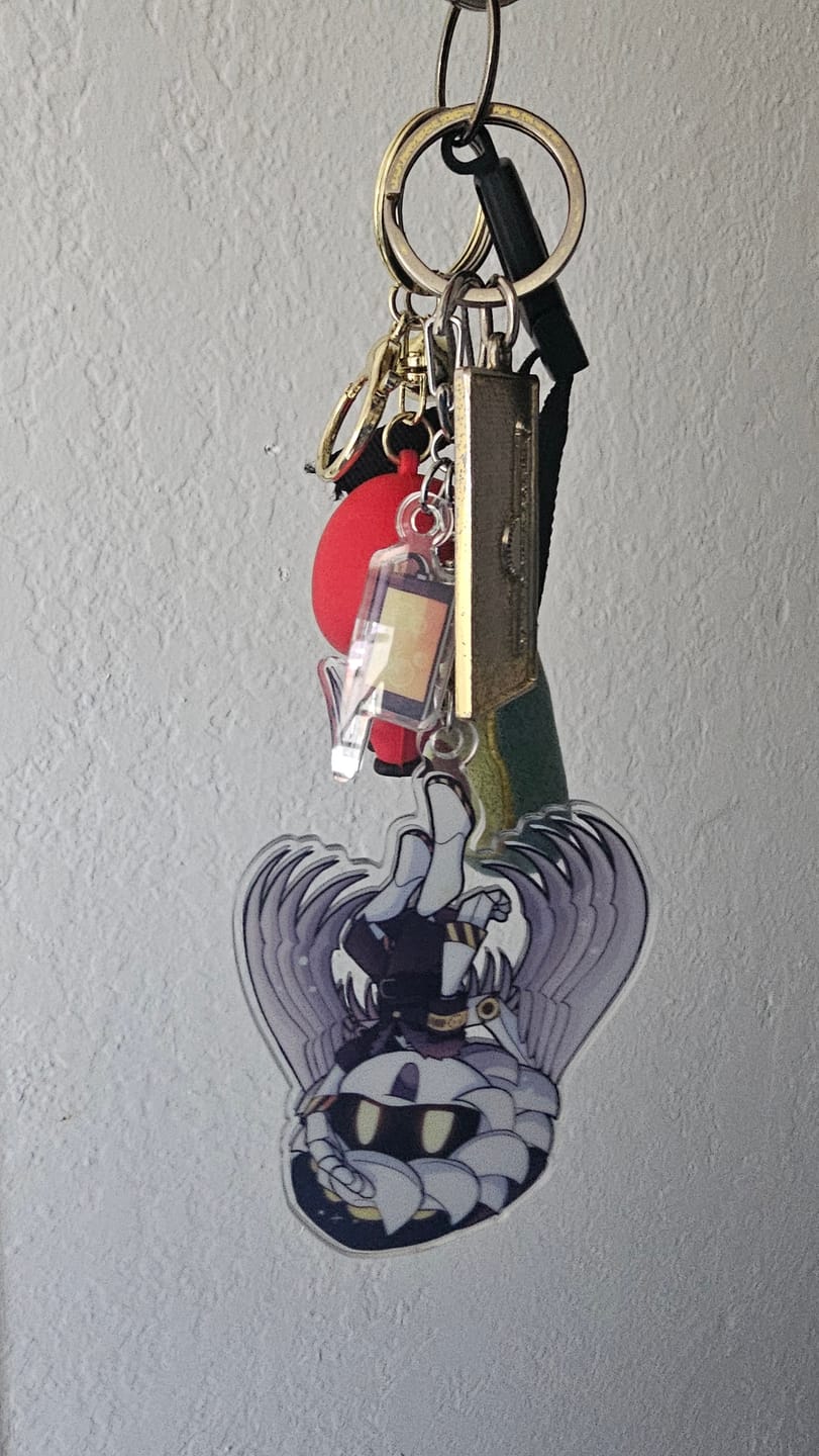Customer photo review of N Hang Tail Keychain
