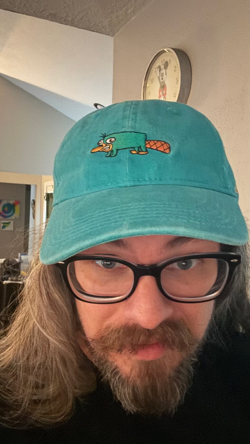 Customer photo review of Disney’s Phineas and Ferb "Semi-Aquatic Egg-Laying Mammal of Action" – Dad Hat
