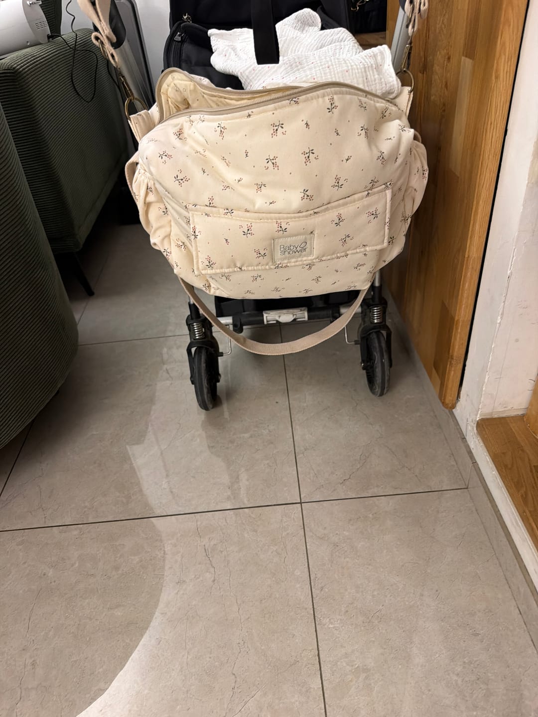 Customer photo review of תיק עגלה כולל משטח החתלה נייד  "קמילה" מכותנה אורגנית - מעוטר בדומדמניות