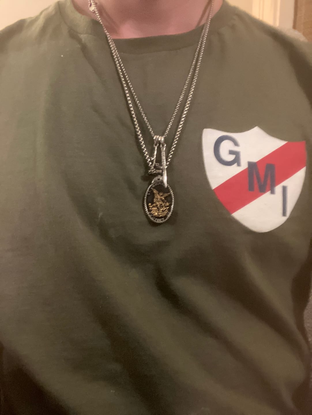 Customer photo review of ST. MICHAELS BADGE.