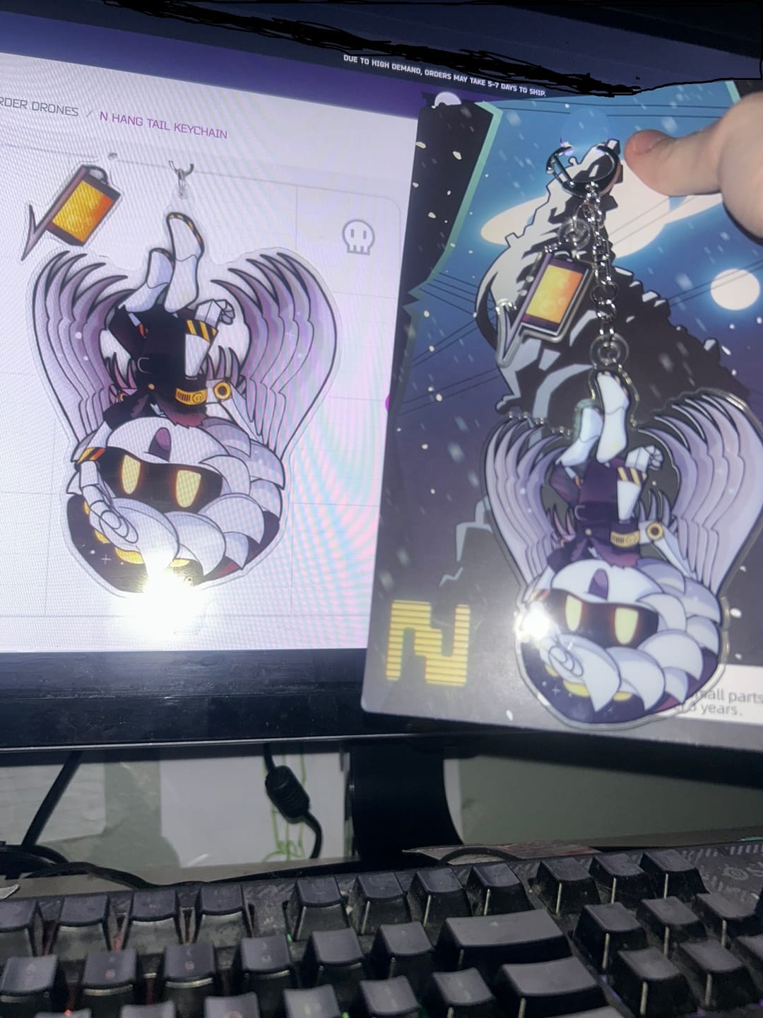 Customer photo review of N Hang Tail Keychain
