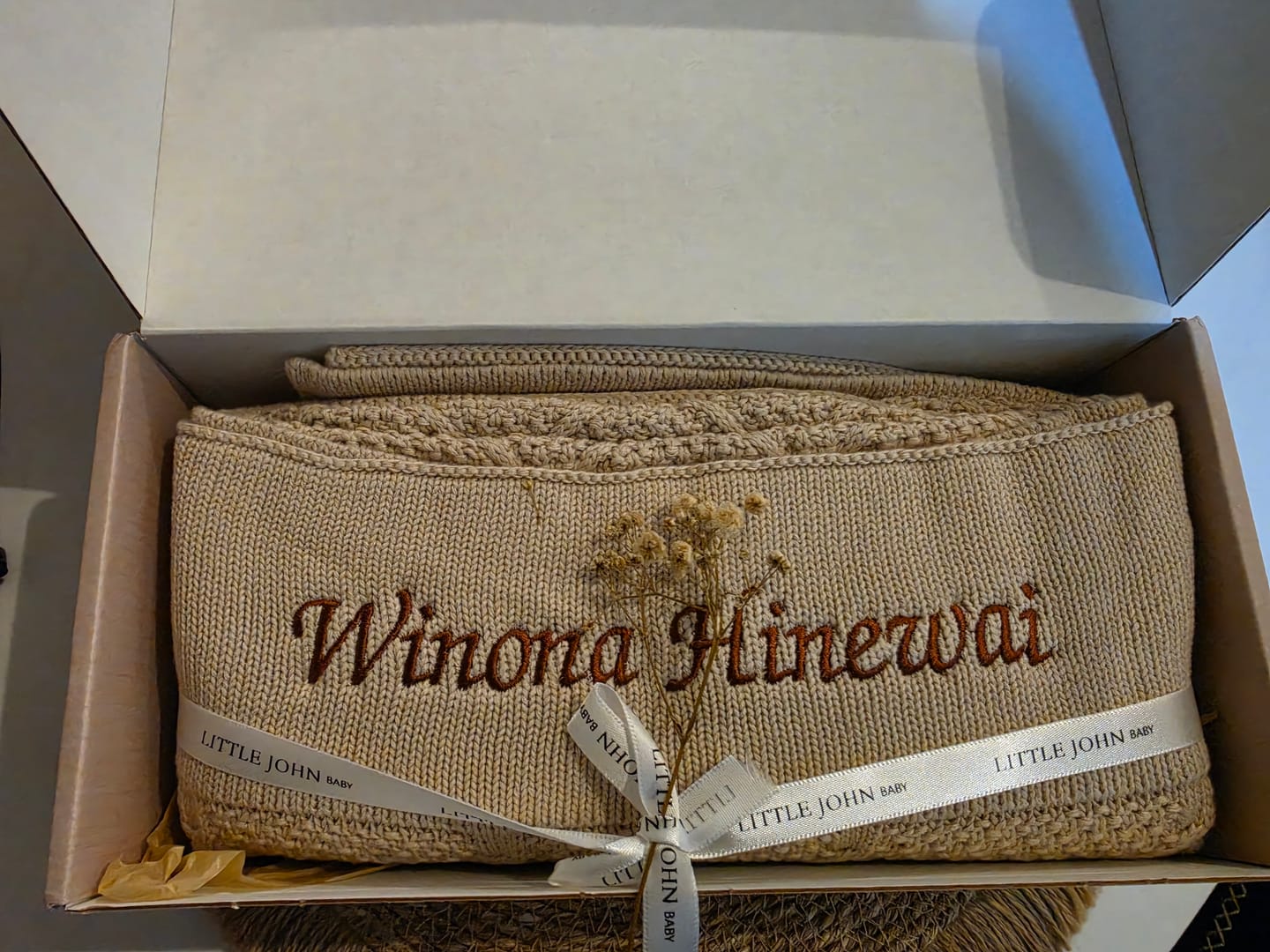 Customer photo review of PRE-ORDER - Personalised Oat Diamond Knitted Blanket