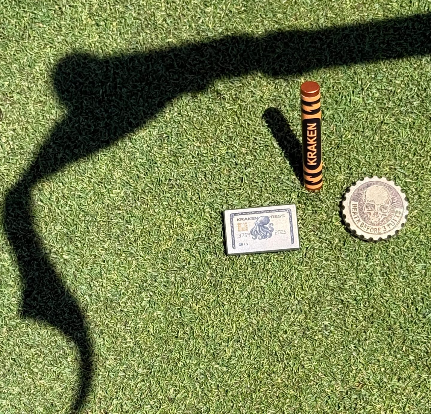 Customer photo review of The Silver Kraken Express Ball Marker | Kraken Titanium Golf Ball Marker