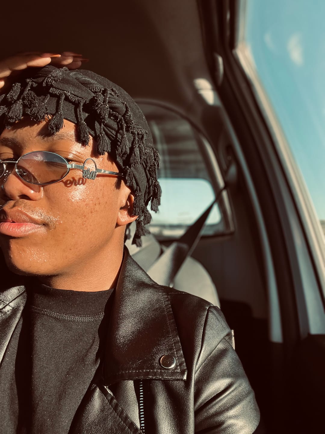 Customer photo review of Muse Logo Sunglasses – Silver Edition