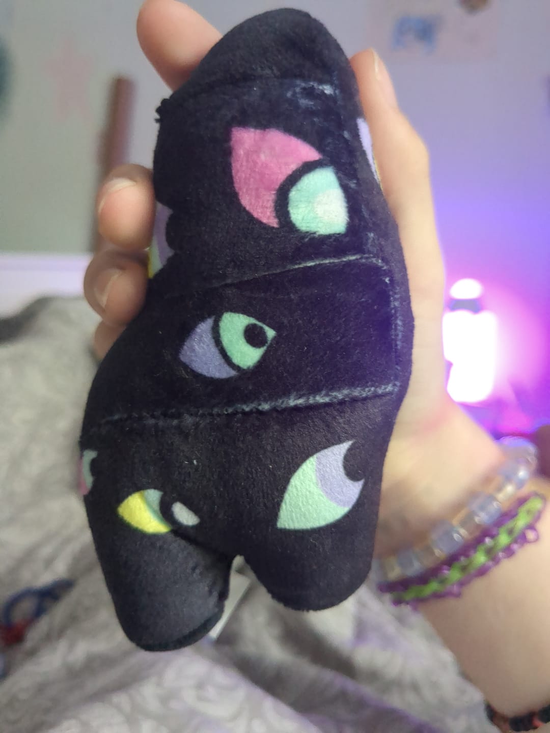 Customer photo review of Pomni & Abstraction Magnetic Plush Keychains