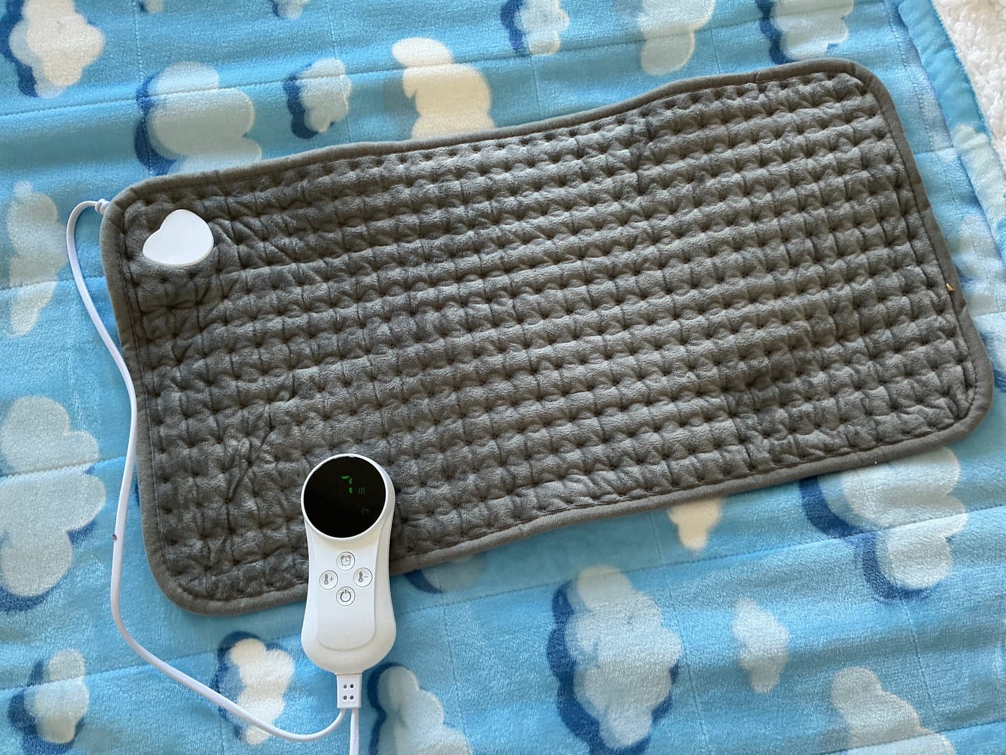 Customer photo review of Heated Therapy Pad for Back, Neck & Muscle Relief