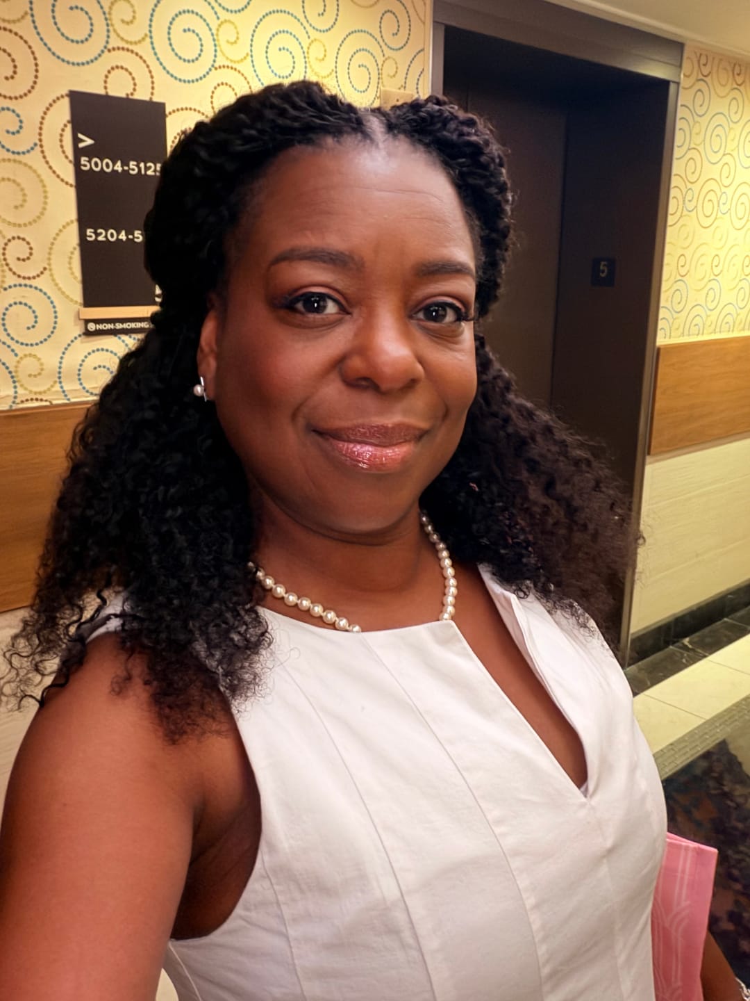 Customer photo review of Outre X-Pression 100% Remy Human Hair Feather Crochet Braid - BURMESE 18"