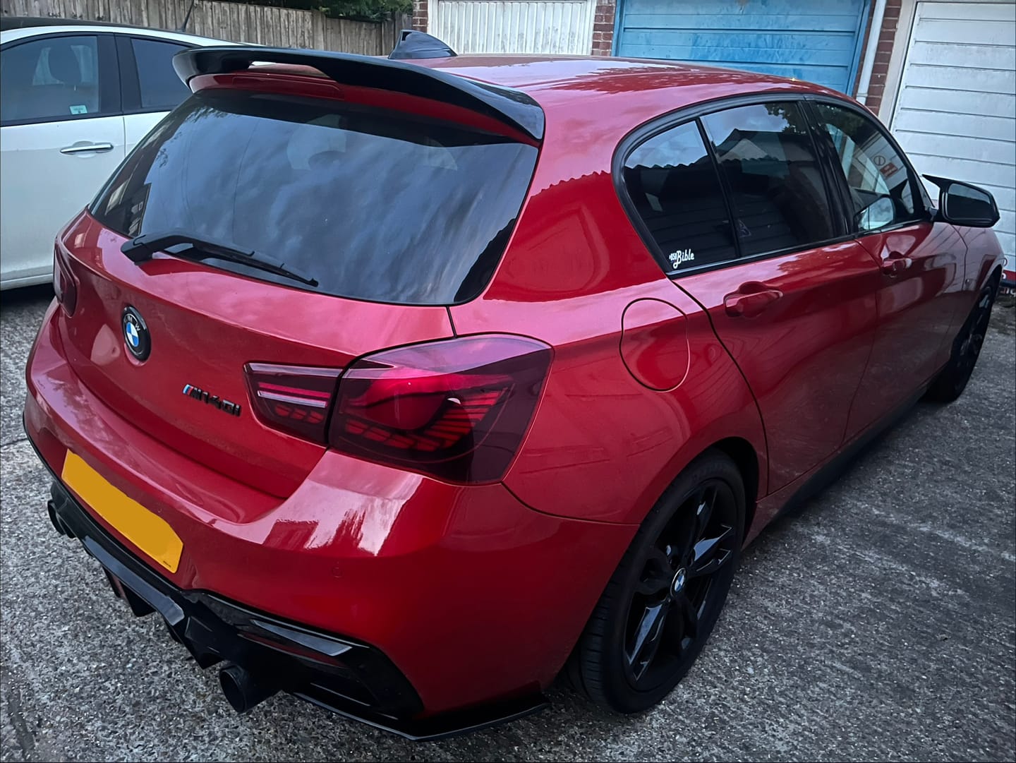 Customer photo review of Black M140i Badges