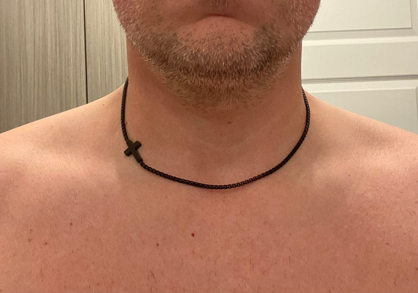 Customer photo review of FREE Today: Sleek Stainless Steel Cross Necklace with Sideways Pendant: A Reminder of Divine Grace