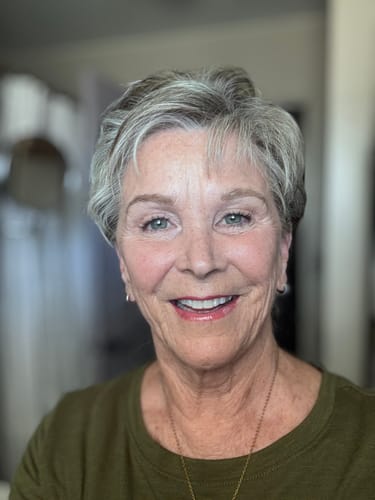 Close-up of a smiling reviewer showing their healthy, glowing skin after using Deep Collagen Cream.