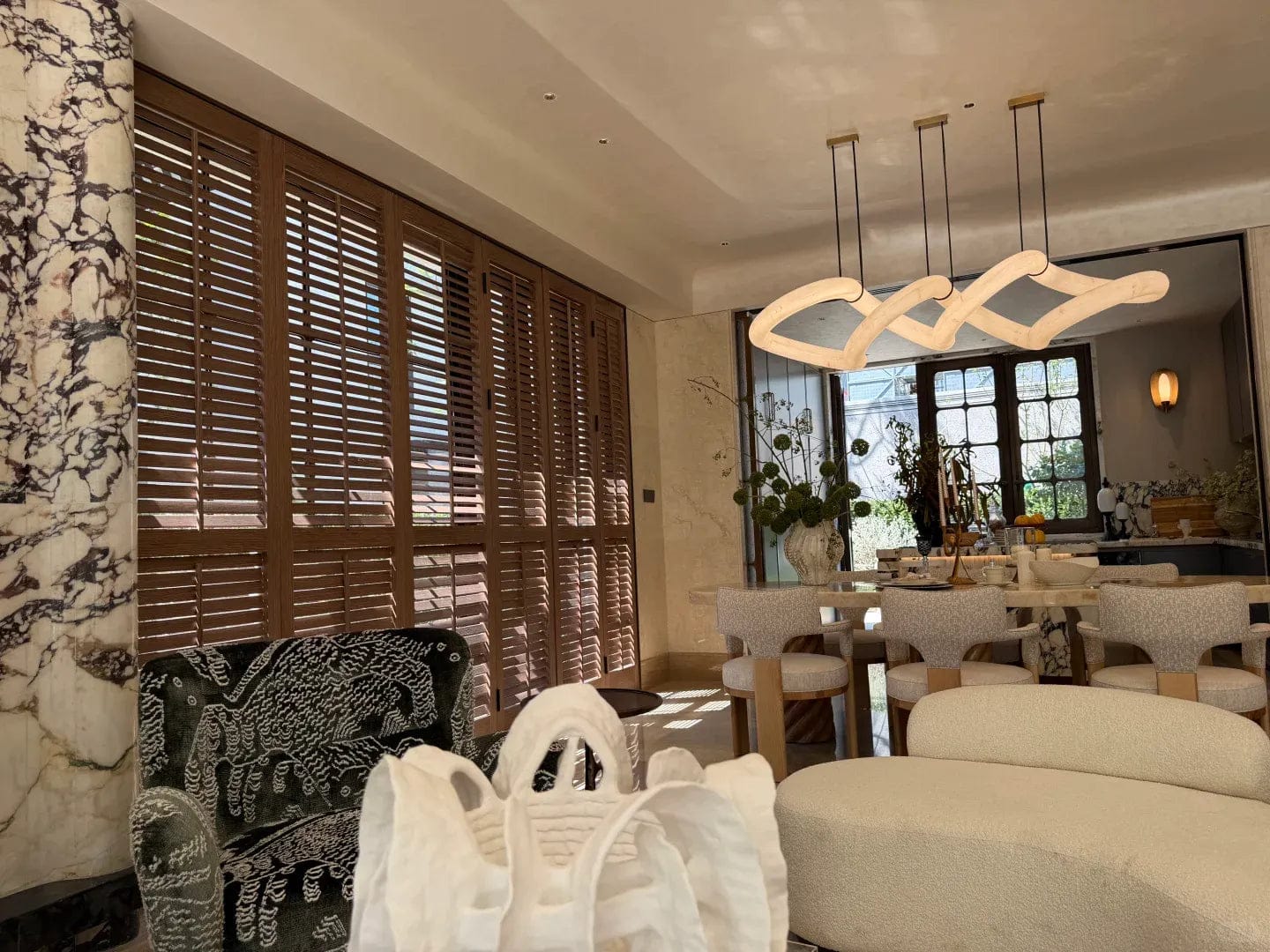 Customer photo review of Streamlined Alabaster Linear And Curved Chandelier