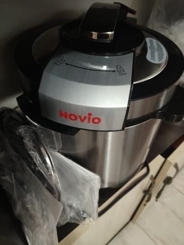 A customer's Novio SteelCook, a stainless steel multicooker, on a countertop.