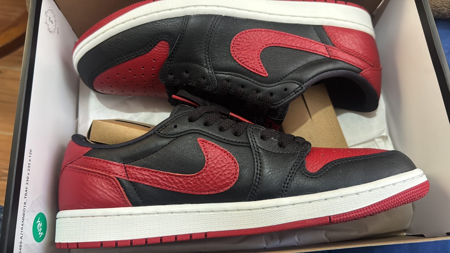 Customer photo review of Air Jordan 1 Retro Low OG "Banned" Black and Varsity Red