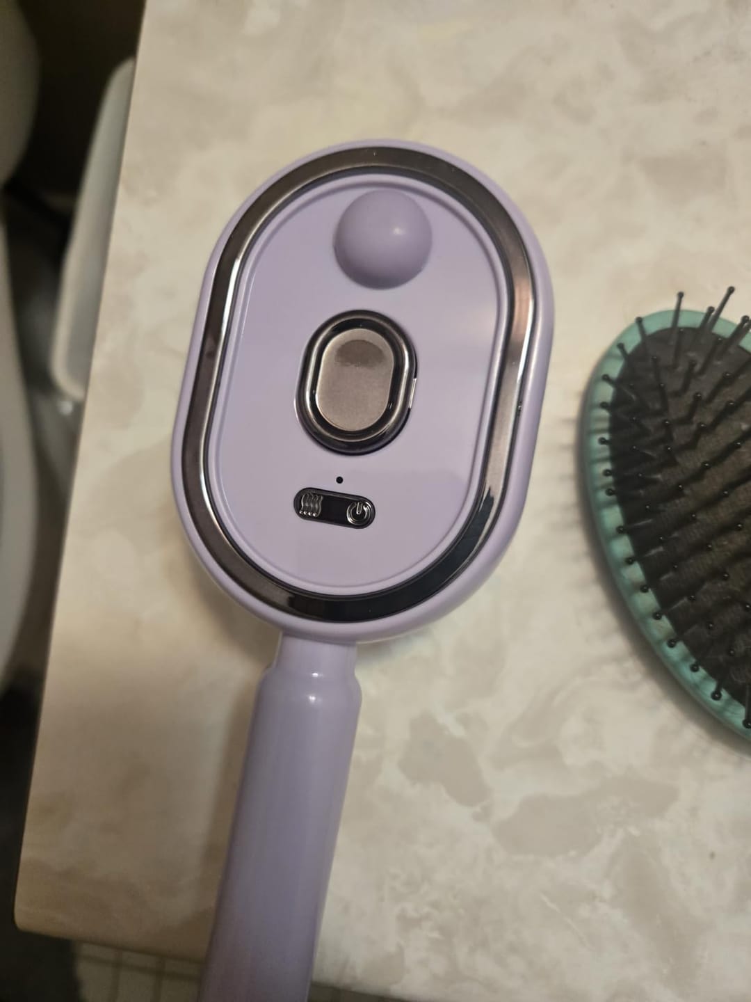 Customer photo review of Electric Steam Brush for Hair