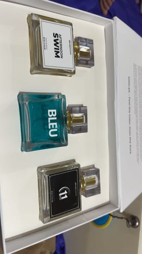 Customer's open Summer Box displaying the three perfume bottles from the collection inside.