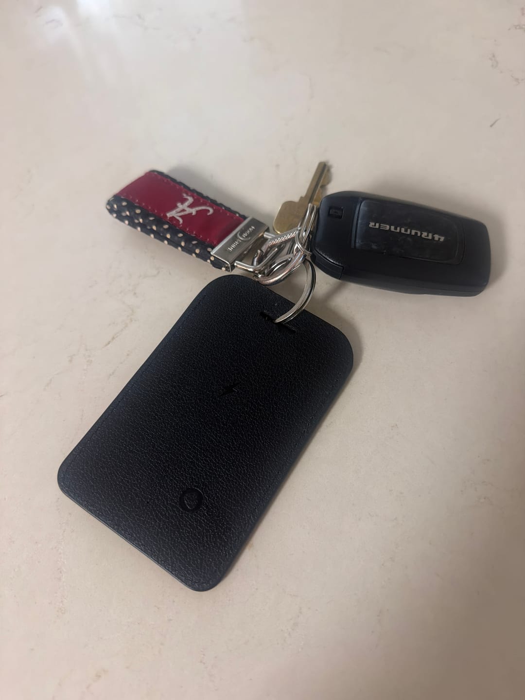 Customer photo review of Trackable Luggage Tag