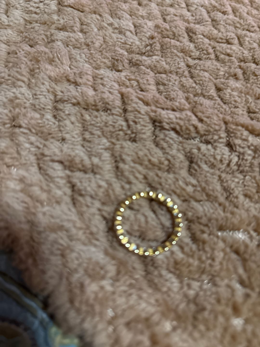 Customer photo review of 3mm Moissanite Round Cut Bezel Eternity Ring