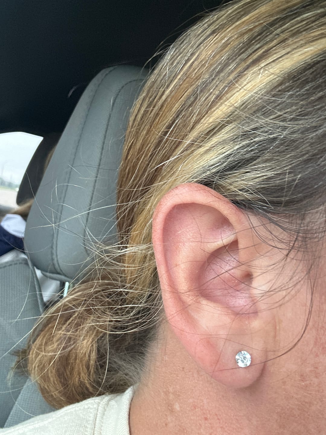 Customer photo review of Petite Faux Diamond Studs Hypoallergenic Earrings for Sensitive Ears with Plastic Posts