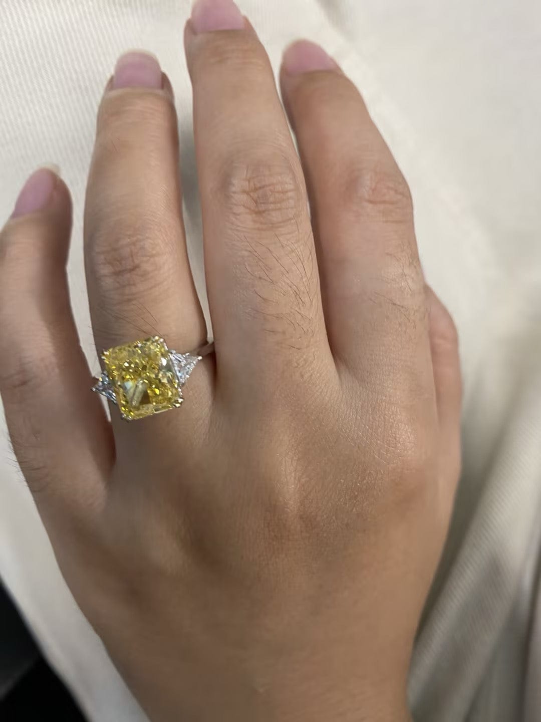 Customer photo review of S925 4.0Ct Radiant & Triangle Cut Yellow Stone Three Stone Engagement Ring In Sterling Silver