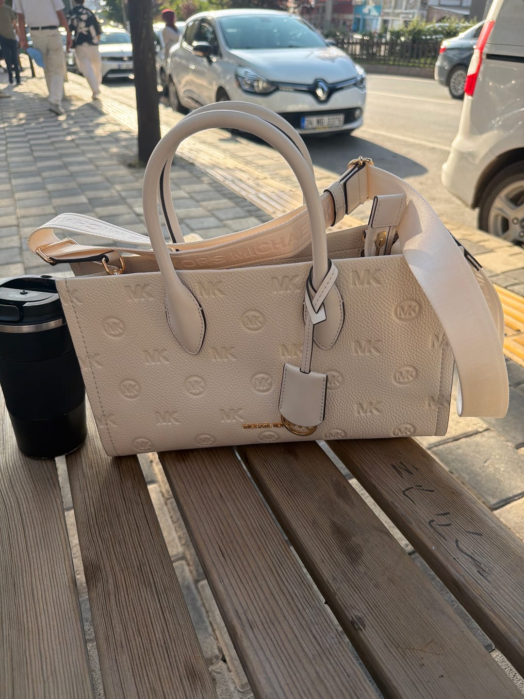 Customer photo review of Michael Kors Women's Mirella Medium Logo Debossed Satchel Bag Light Cream/Gold