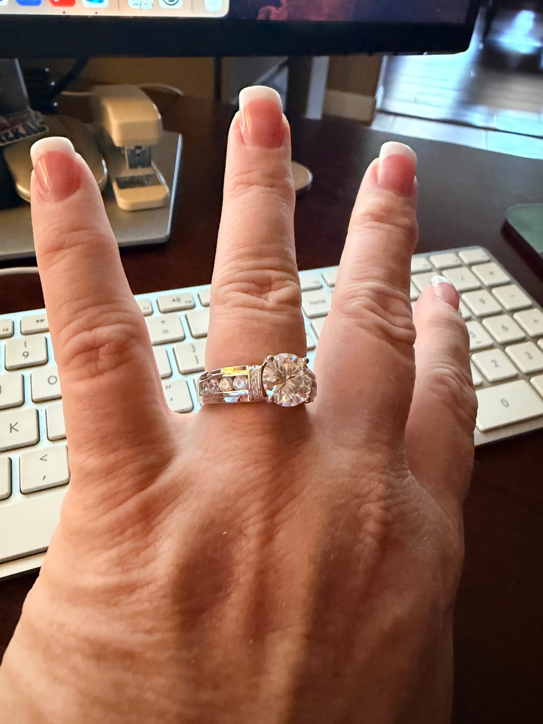 Customer photo review of Moissanite With Channel Set Sapphire Accents Engagement Ring