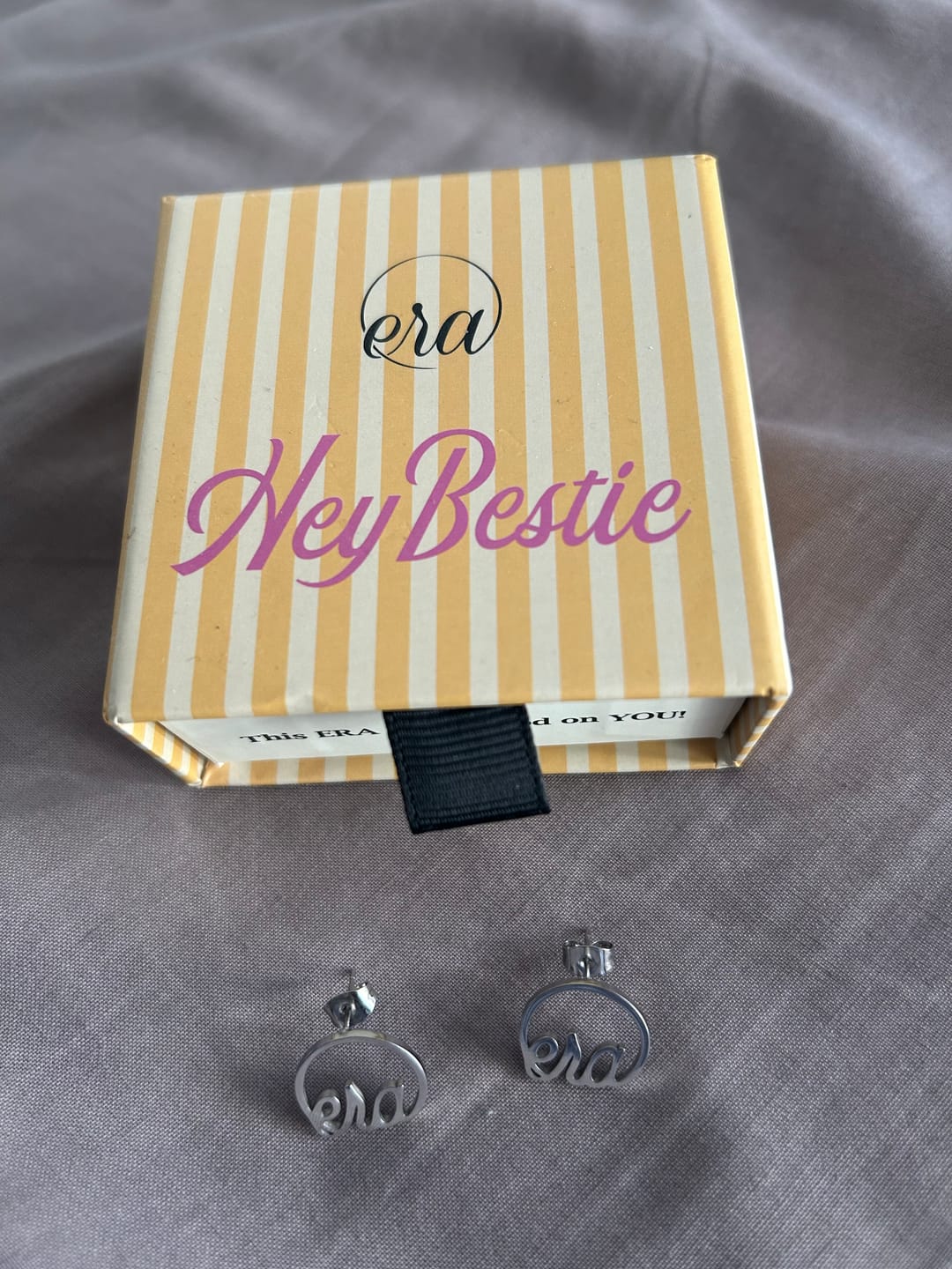 Customer photo review of Silver Era Logo Studs