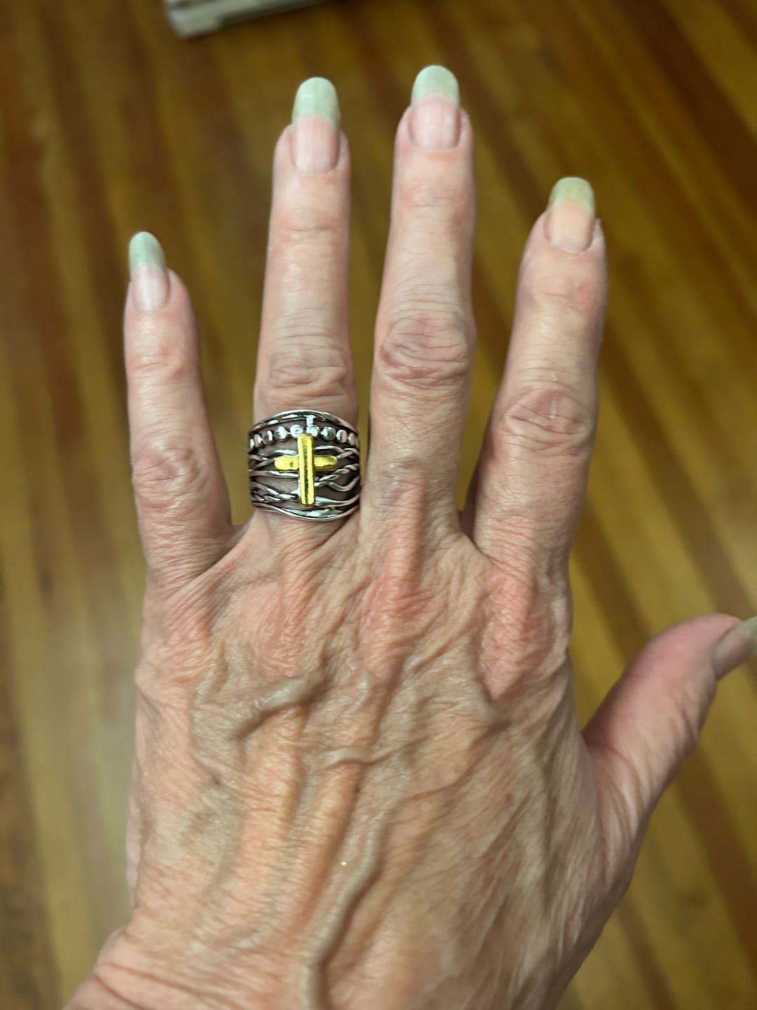 Customer photo review of Christianartworkshop Two-Tone Copper Cross Ring: Quiet Reminder of Peace & Grace
