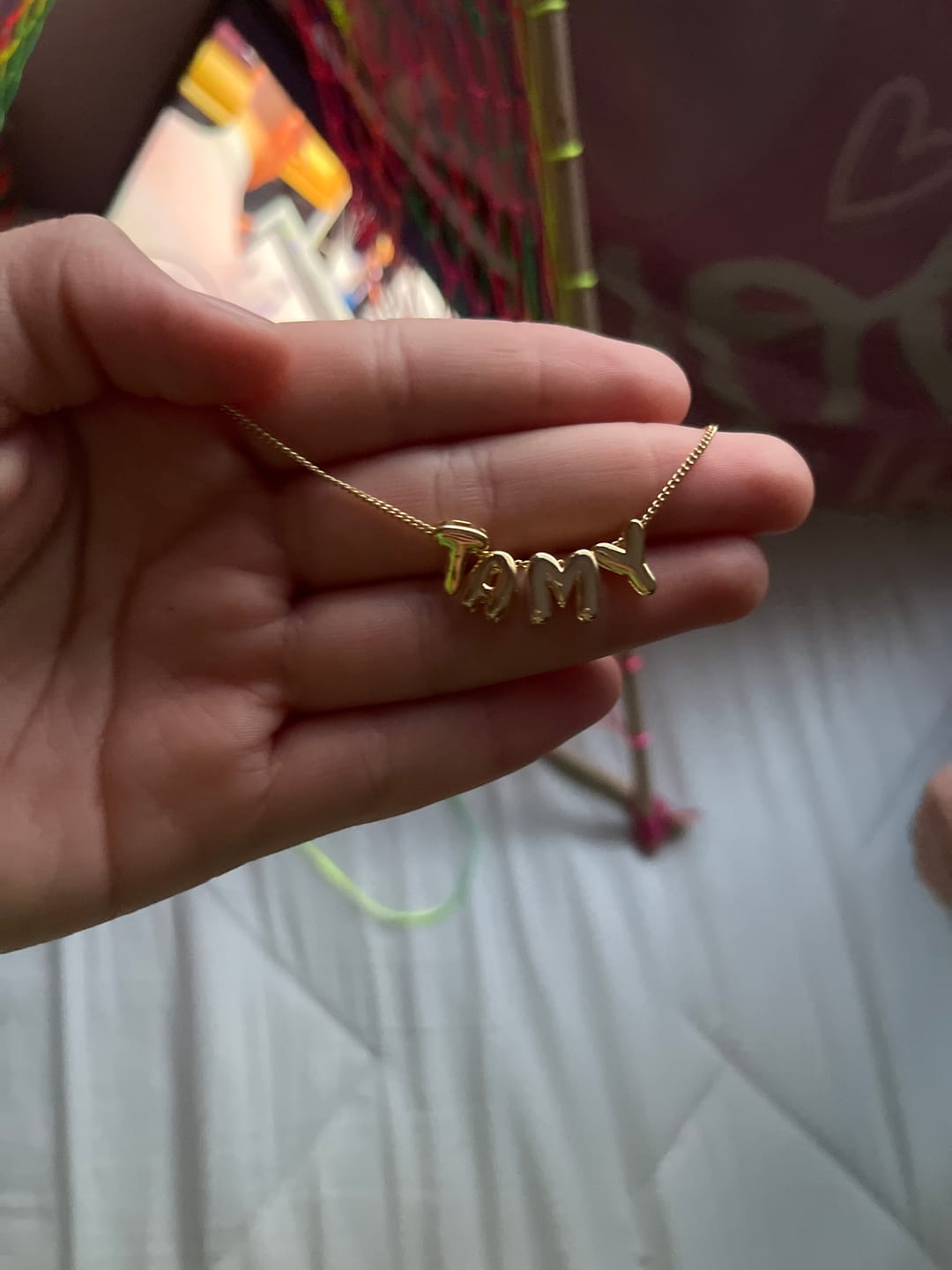 Customer photo review of Collar Dorado Liso Inicial Balloon